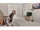 Comfortable office featuring a cozy chair, a view to a bed room, and plenty of natural light at 2510 Shoreline Pkwy, Villa Rica, GA 30180