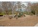 A community playground featuring various climbing structures, slides, and swings at 2510 Shoreline Pkwy, Villa Rica, GA 30180