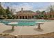 A large community pool covered for the winter months with patio seating and fireplace at 2510 Shoreline Pkwy, Villa Rica, GA 30180