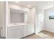 Modern bathroom with double vanity, large mirror, and ample counter space for a luxurious feel at 982 Sutherland Ln # 30, Lawrenceville, GA 30043