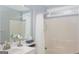 Bathroom features a shower-tub, vanity and chrome fixtures at 1067 Pinehurst Dr, Peachtree City, GA 30269