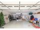 Spacious garage with ample storage space and overhead lighting at 1067 Pinehurst Dr, Peachtree City, GA 30269