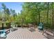 View of spacious back deck, perfect for relaxing and entertaining at 1561 Aiken Chafin Ln, Mcdonough, GA 30252