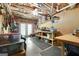 Unfinished basement area with pegboard and workbench at 1561 Aiken Chafin Ln, Mcdonough, GA 30252