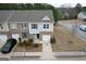 Overhead view of a grey townhome with driveway at 1463 River Stone Trce, Conyers, GA 30012