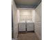 Laundry room featuring a washer and dryer and an open closet at 1463 River Stone Trce, Conyers, GA 30012