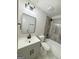 Bathroom showcasing sleek vanity, modern fixtures, and tiled shower/tub combo at 299 Lagrange St, Grantville, GA 30220