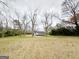 Single-story home with expansive yard and mature trees for privacy and charm at 299 Lagrange St, Grantville, GA 30220