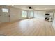 Bright living room area features hardwood floors and abundant natural light from large windows at 299 Lagrange St, Grantville, GA 30220