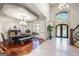 Dining room features hardwood floors, decorative molding, and custom double-door entryway at 4233 Sandstone Shores Dr, Stonecrest, GA 30038