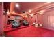 Luxurious home theater featuring tiered seating, premium leather recliners, and a popcorn machine for the ultimate movie experience at 4233 Sandstone Shores Dr, Stonecrest, GA 30038