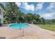 Outdoor swimming pool, in-ground, fenced with hot tub and stone-scaping at 4233 Sandstone Shores Dr, Stonecrest, GA 30038
