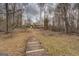 Large backyard and wooden deck, perfect for enjoying the outdoors at 650 Malcom Rd, Covington, GA 30014