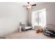 Bright bedroom with a large window, neutral walls, and carpeted flooring at 430 Gregory Rd, Covington, GA 30014