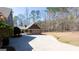 Spacious detached garage with a long driveway, offering ample parking and curb appeal at 430 Gregory Rd, Covington, GA 30014