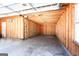 Unfinished garage with exposed framing, providing a blank canvas for customization and future development at 430 Gregory Rd, Covington, GA 30014