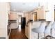 Charming kitchen featuring wood cabinets, stainless appliances, and a breakfast bar at 430 Gregory Rd, Covington, GA 30014