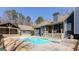 Beautiful backyard featuring a pool, spacious patio, and an outdoor area at 430 Gregory Rd, Covington, GA 30014
