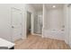 Bathroom featuring a bathtub, shower, and light wood flooring at 903 Hollytree Pl, Acworth, GA 30102