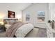 Cozy bedroom with vaulted ceiling, two windows, and coordinating decor at 903 Hollytree Pl, Acworth, GA 30102