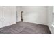 Bedroom featuring neutral carpet and two closets at 903 Hollytree Pl, Acworth, GA 30102
