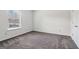 Bedroom with neutral carpet and a window to allow natural light at 903 Hollytree Pl, Acworth, GA 30102