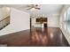 Bright living room with dark hardwood floors and view of the kitchen at 903 Hollytree Pl, Acworth, GA 30102