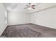 Spacious carpeted bedroom featuring a tray ceiling and recessed lighting at 903 Hollytree Pl, Acworth, GA 30102