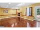 Finished basement with hardwood floors, recessed lighting, window seat, and built-in shelves for storage and décor at 1300 Lakehaven Pkwy, Mcdonough, GA 30253