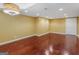 Finished basement with hardwood floors and recessed lighting at 1300 Lakehaven Pkwy, Mcdonough, GA 30253