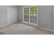 Comfortable bedroom with natural light and a double closet at 1300 Lakehaven Pkwy, Mcdonough, GA 30253