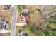 Overhead shot of a home with red deck, a long driveway, and a large, grassy backyard at 510 Virginia Highlands, Fayetteville, GA 30215