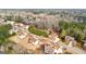 An aerial view captures homes with green lawns and tree-lined streets in a suburban neighborhood at 510 Virginia Highlands, Fayetteville, GA 30215