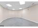 Spacious finished basement rec room with a drop ceiling and tile flooring at 510 Virginia Highlands, Fayetteville, GA 30215