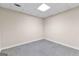 Finished basement space with tile flooring and drop ceiling at 510 Virginia Highlands, Fayetteville, GA 30215