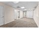 Finished basement area featuring carpeted flooring, a mirrored wall, and ample space for activities at 510 Virginia Highlands, Fayetteville, GA 30215