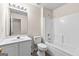 The bathroom features a vanity with a sink, toilet, and a bathtub with a shower at 510 Virginia Highlands, Fayetteville, GA 30215
