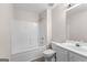 The bathroom features a vanity with a sink, toilet, and a bathtub with a shower at 510 Virginia Highlands, Fayetteville, GA 30215