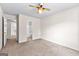 Bedroom with carpet, ceiling fan, and attached bathroom with a shower and tub at 510 Virginia Highlands, Fayetteville, GA 30215
