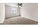 Bedroom with carpet flooring, a ceiling fan and a window at 510 Virginia Highlands, Fayetteville, GA 30215