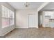 Dining room with ample natural light, closet, and chandelier at 510 Virginia Highlands, Fayetteville, GA 30215