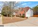 Spacious brick home with attached garage and well-kept lawn at 510 Virginia Highlands, Fayetteville, GA 30215