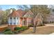 Charming brick home with a well-manicured lawn and a lovely bay window at 510 Virginia Highlands, Fayetteville, GA 30215