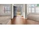 Inviting foyer with hardwood floors and views into adjacent rooms, filled with natural light at 510 Virginia Highlands, Fayetteville, GA 30215