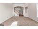 Spacious living room with neutral carpet and open layout, perfect for entertaining at 510 Virginia Highlands, Fayetteville, GA 30215