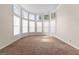 Bright living room featuring a large bay window providing natural light and a cozy atmosphere at 510 Virginia Highlands, Fayetteville, GA 30215