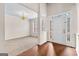 Bright living room with carpet and white door at 510 Virginia Highlands, Fayetteville, GA 30215