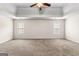 Spacious primary bedroom featuring a ceiling fan, neutral walls, and carpet at 510 Virginia Highlands, Fayetteville, GA 30215