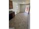 Bright kitchen dining area leading to backyard access at 220 Cabriolet Trl, Mcdonough, GA 30253
