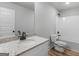 Bright bathroom featuring granite countertop, sink, mirror, vanity, toilet, and shower/tub combo at 4139 Alayna Lee Cir, Mcdonough, GA 30252